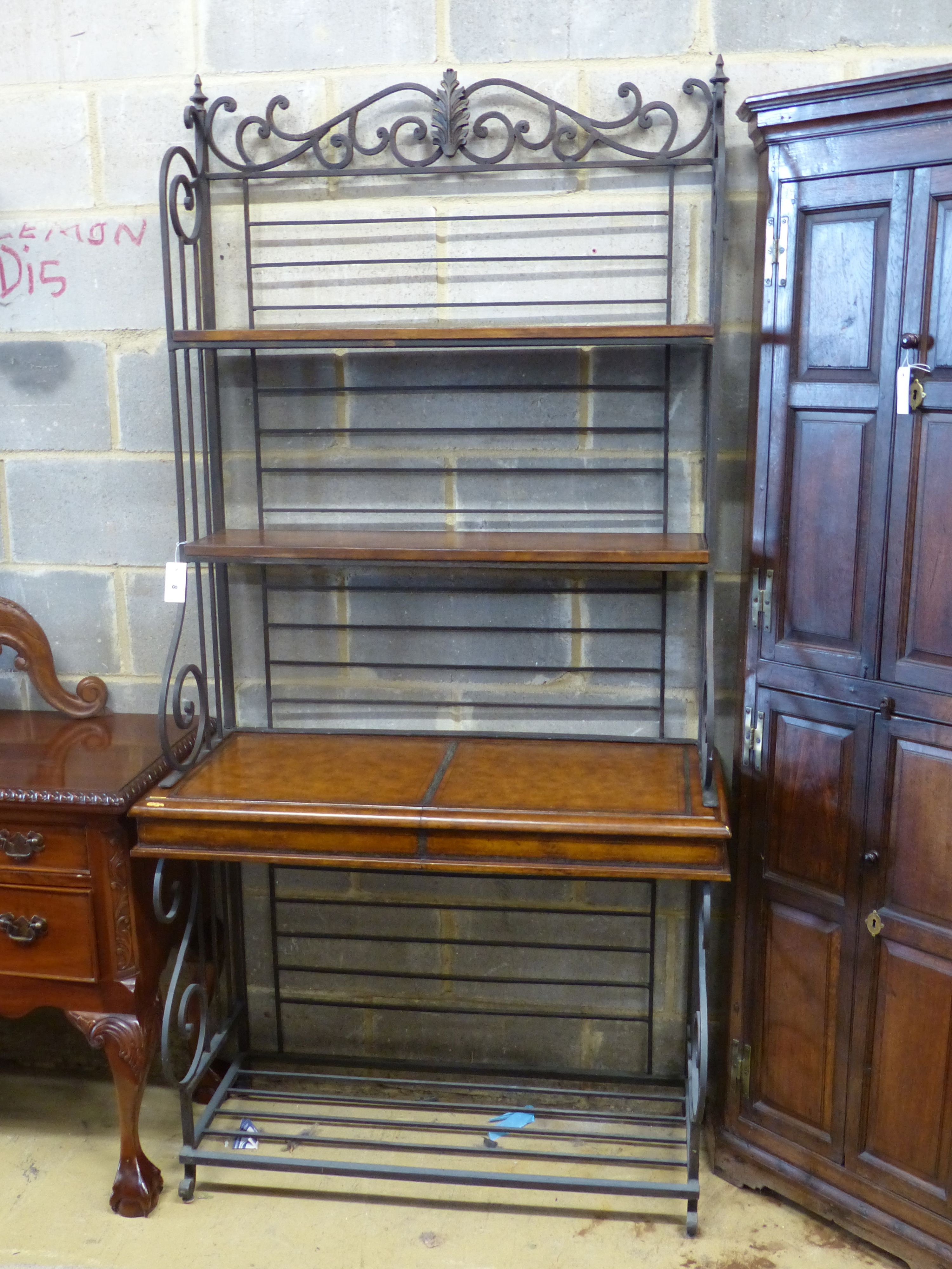 A reproduction leather mounted baker's rack, width 102cm depth 44cm height 206cm